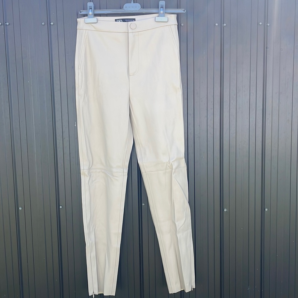 Light neutral leather pant with beautiful stitch details